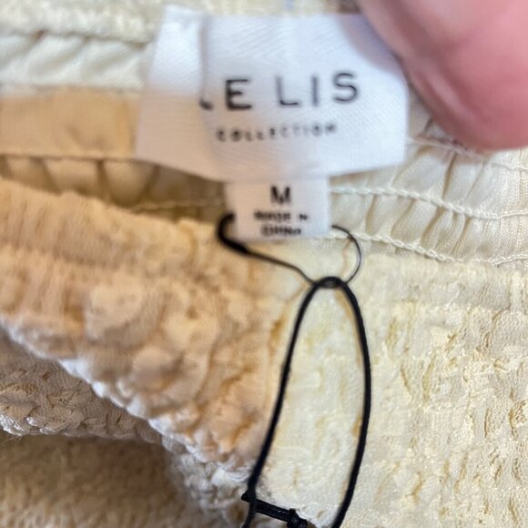 Le Lis Women's Cream Smocked Lace Mini Skirt With Ruffle Hem - Picture 6 of 9